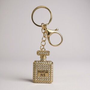 Gold Parfum Rhinestone charm keys or bags with gold accents